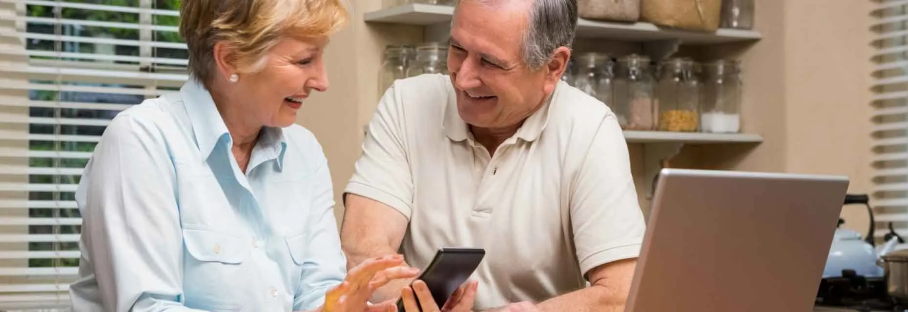 Couple reviewing important legal documents together online in the US